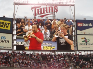 Manny and Lynn perform the Star-Spangled Banner at a Minnesota Twins Game